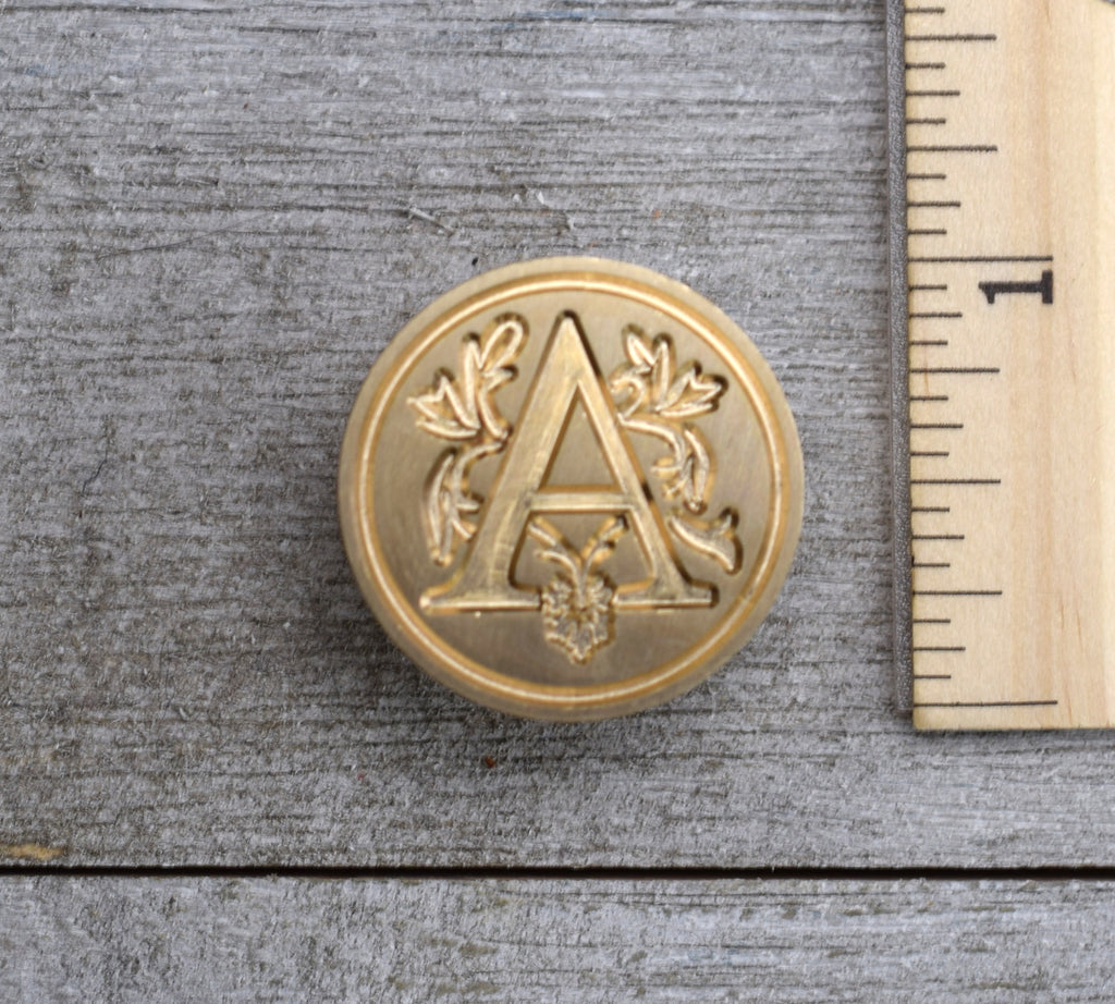 closeup of letter A wax seal stamp