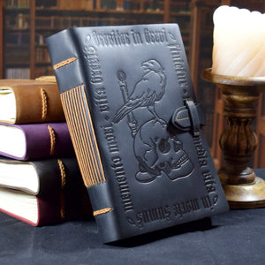 Black Leather Grimoire with Skull and Candle