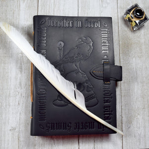 Black Leather Grimoire with Skull and Candle