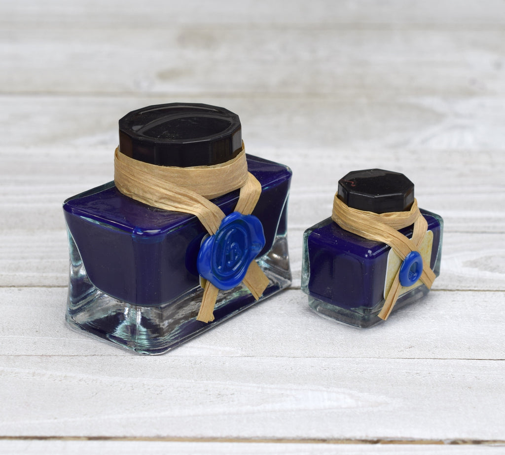 Blue ink bottles sealed with wax