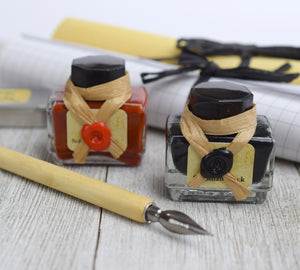 writing ink bottles and pen