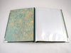 art portfolio with page sleeves with marbled paper inside cover