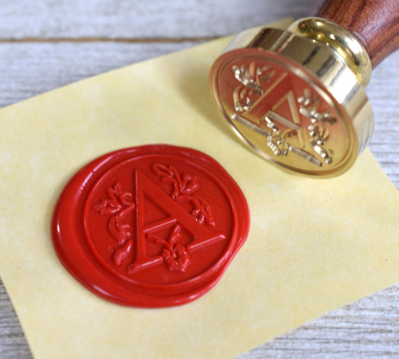 initial letter wax seal stamp with red wax