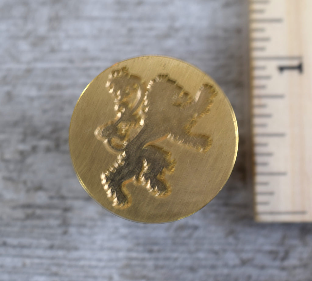 closeup of lion brass stamp head