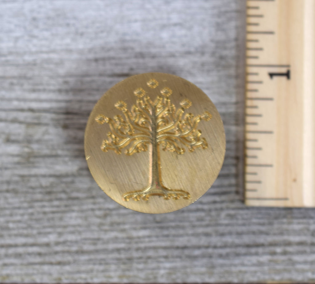 closeup of tree of gondor brass stamp head