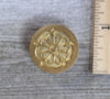 closeup of tudor rose brass stamp head